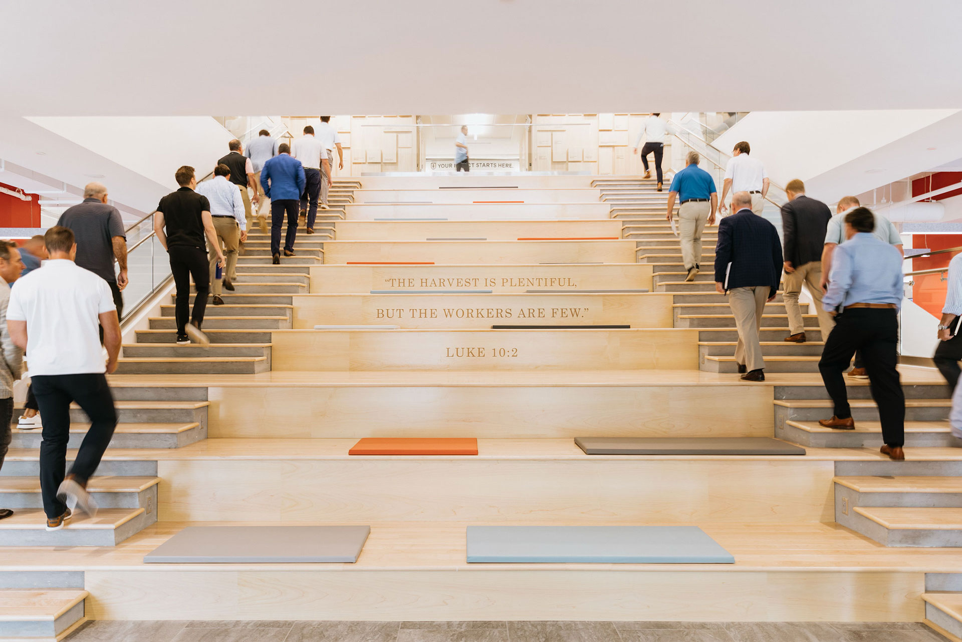 donors walking up the communication stairs